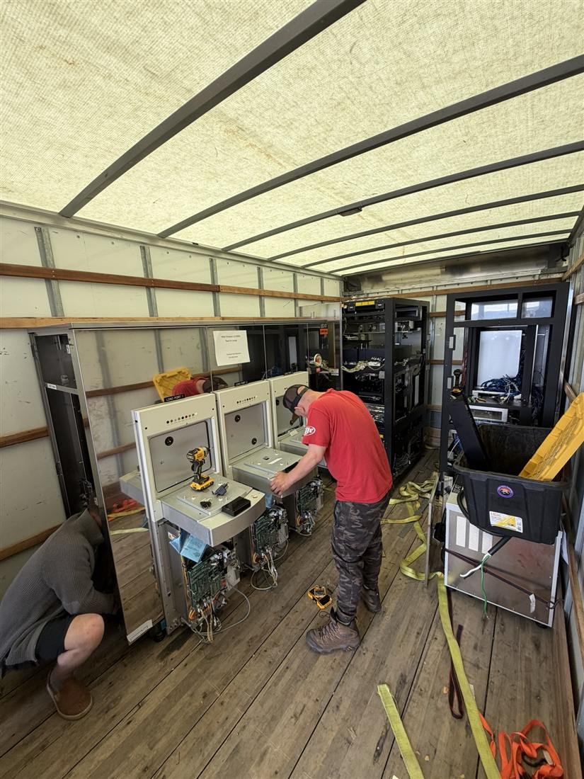 Commercial equipment removal with box truck at a Portland business