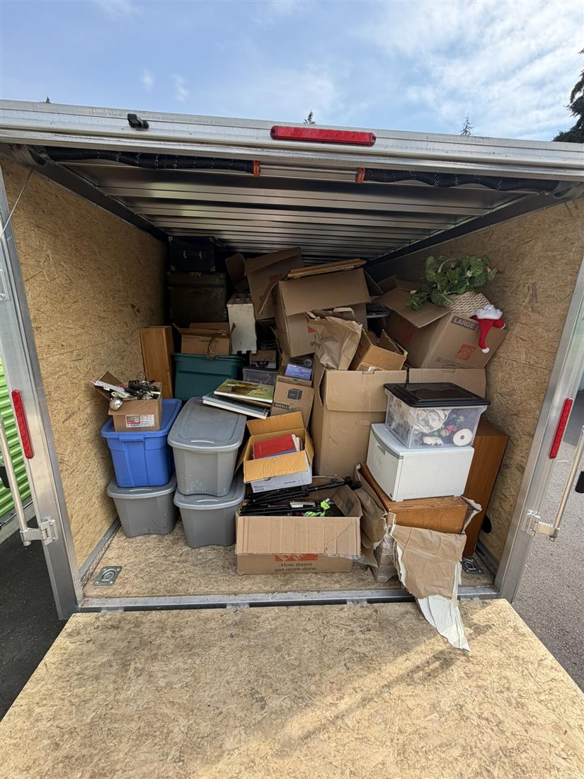 Enclosed trailer loaded from a storage unit cleanout